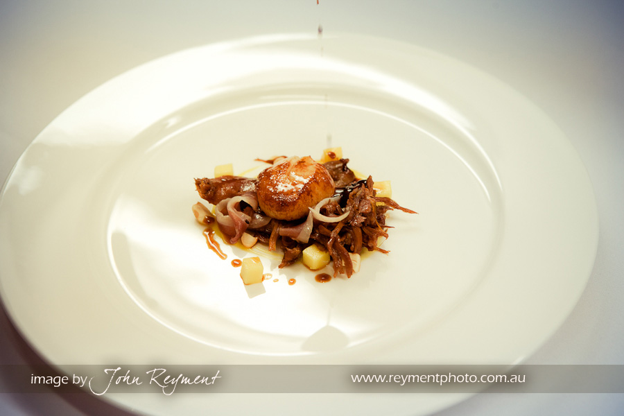 Spicer's Clovelly Estate, Seared Harvey bay scallops, glazed duck confit, mango puree, duck ham and toasted cashews.