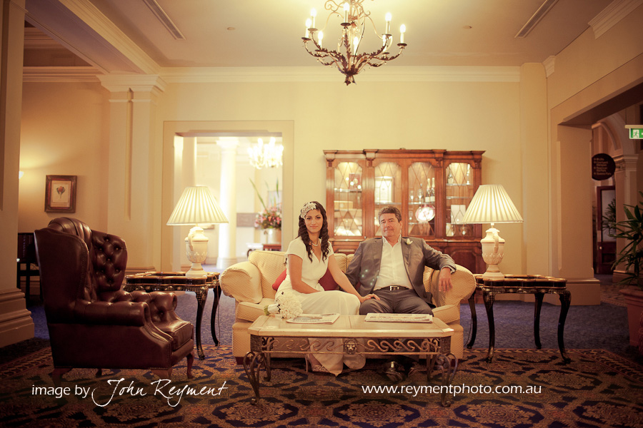 Bride &groom in Foyer, Conrad Hotel Brisbane, Brisbane wedding photographer Reyment Photographics