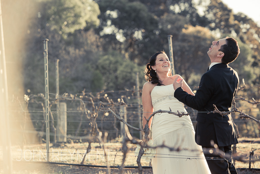A candid moment at a Sirromet Winery wedding by Brisbane wedding photographer John Reyment