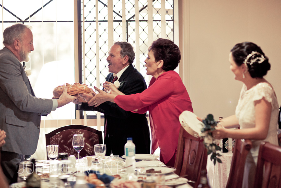 Macedonian wedding breaking of the bread ceremony by Brisbane wedding photographer John Reyment