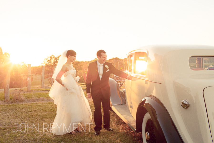 late afternoon with wedding car at Sirromet Winery by Brisbane wedding photographer John Reyment